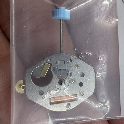 Ronda 763 quartz watch movement with high canon pinion, Swiss parts for precise timekeeping.