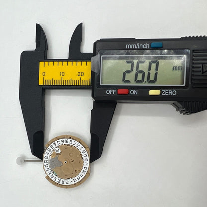 Sunon PE60 quartz watch with date window at 3 and small seconds subdial at 6, classic 3-hand design.