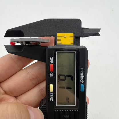 Miyota 2415 quartz movement with black date disk at 3 o'clock, precision Japan-made watch part.