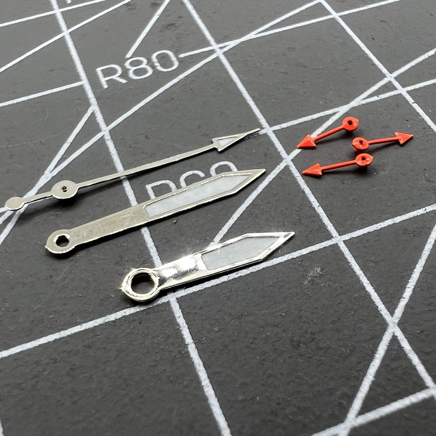 Silver-trimmed green luminous pointed watch hands for Miyota 0S10, precise stylish upgrade.