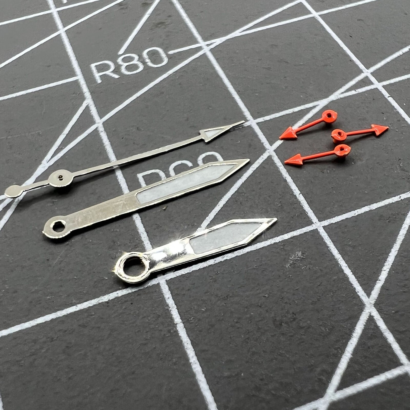 Silver-trimmed green luminous pointed watch hands for Miyota 0S10, precise stylish upgrade.