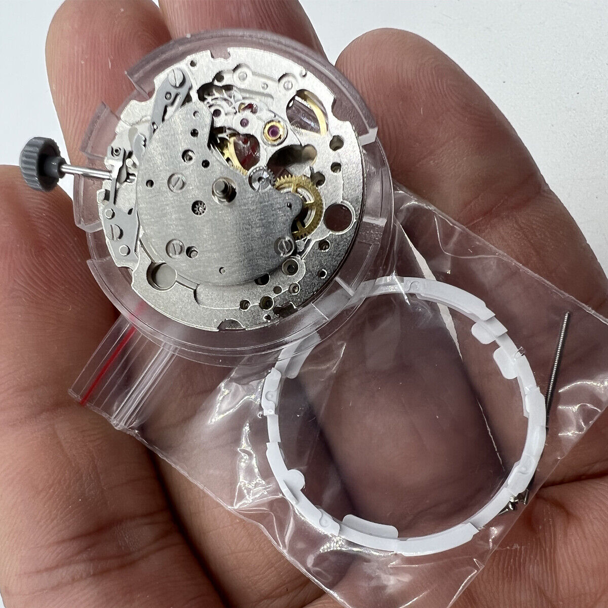 Miyota Citizen 82S7 silver plated automatic mechanical watch movement from Japan, precise timekeeping components.