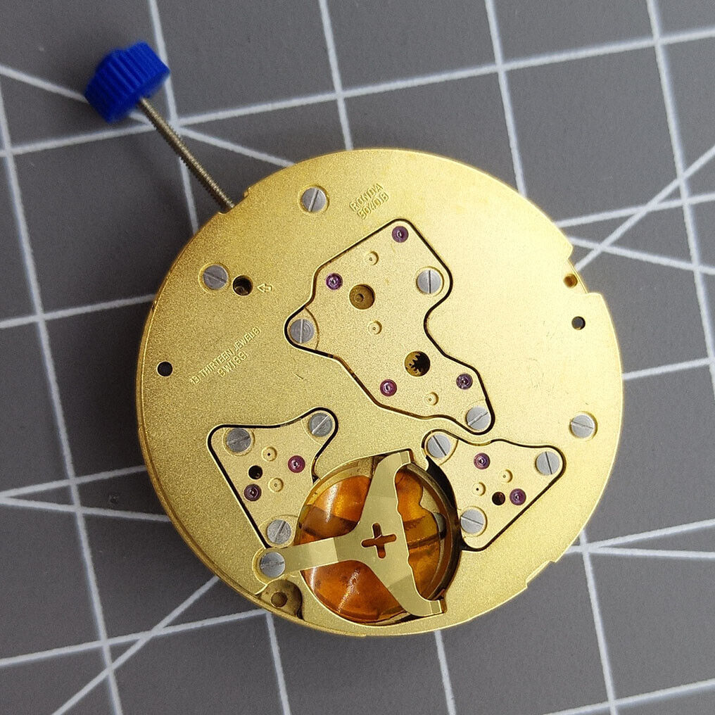 Golden Swiss Ronda 5040B quartz watch movement showcasing precision and luxury for premium accessories.