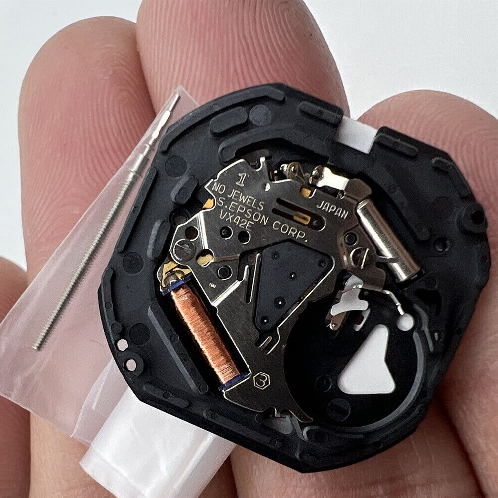 Shiojiri Hattori VX42 VX42E quartz watch movement showing day and date at 3 and 6 o'clock, brand new.