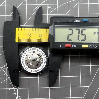 Hattori Epson TMI YM26A quartz watch movement, Japan-made, precise replacement for watch repairs.