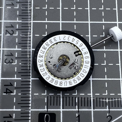 Ronda 585 Swiss quartz watch movement with date at 6 o'clock, precision timekeeping.