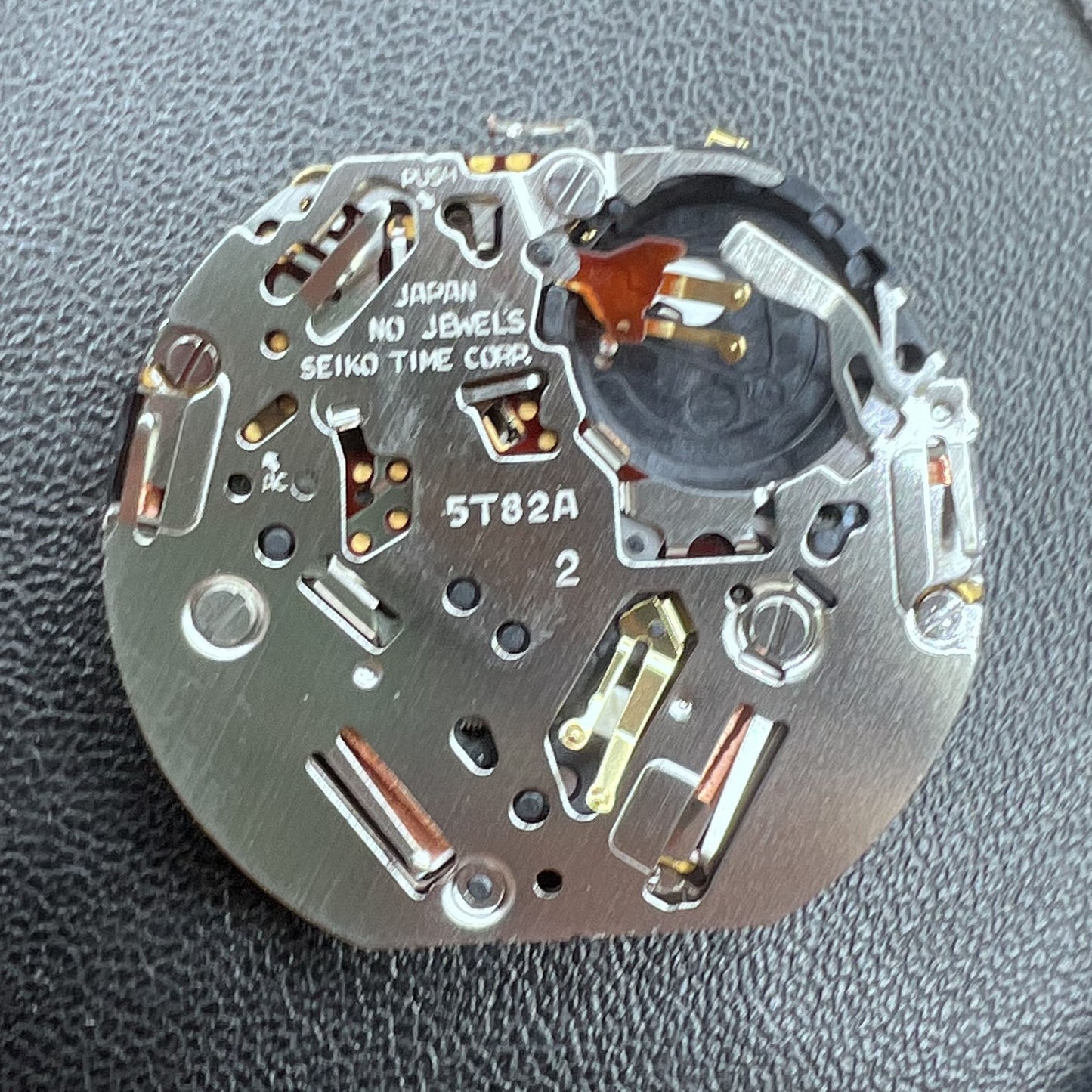 Seiko Japan 5T82A quartz movement for precise timekeeping in watch accessories.
