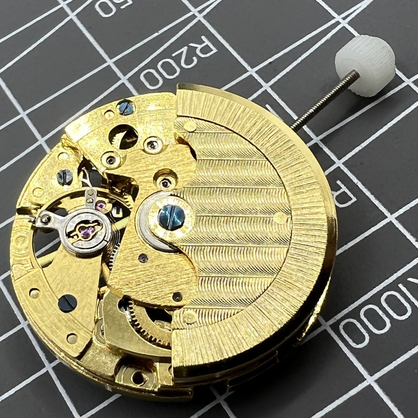 Skeleton dial Generic 8205 mechanical watch showcasing star phase and small seconds subdial at 5 o?clock position.