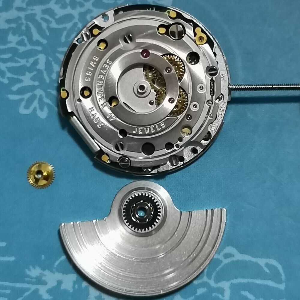 Swiss Made ETA 204.911 mechanical watch movement with automatic winding, precision watch accessory component.