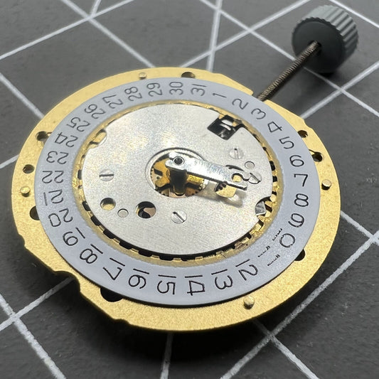 Swiss Ronda 785 quartz watch movement with date at 4 o?clock, 3 hands, precise timing for watchmakers.