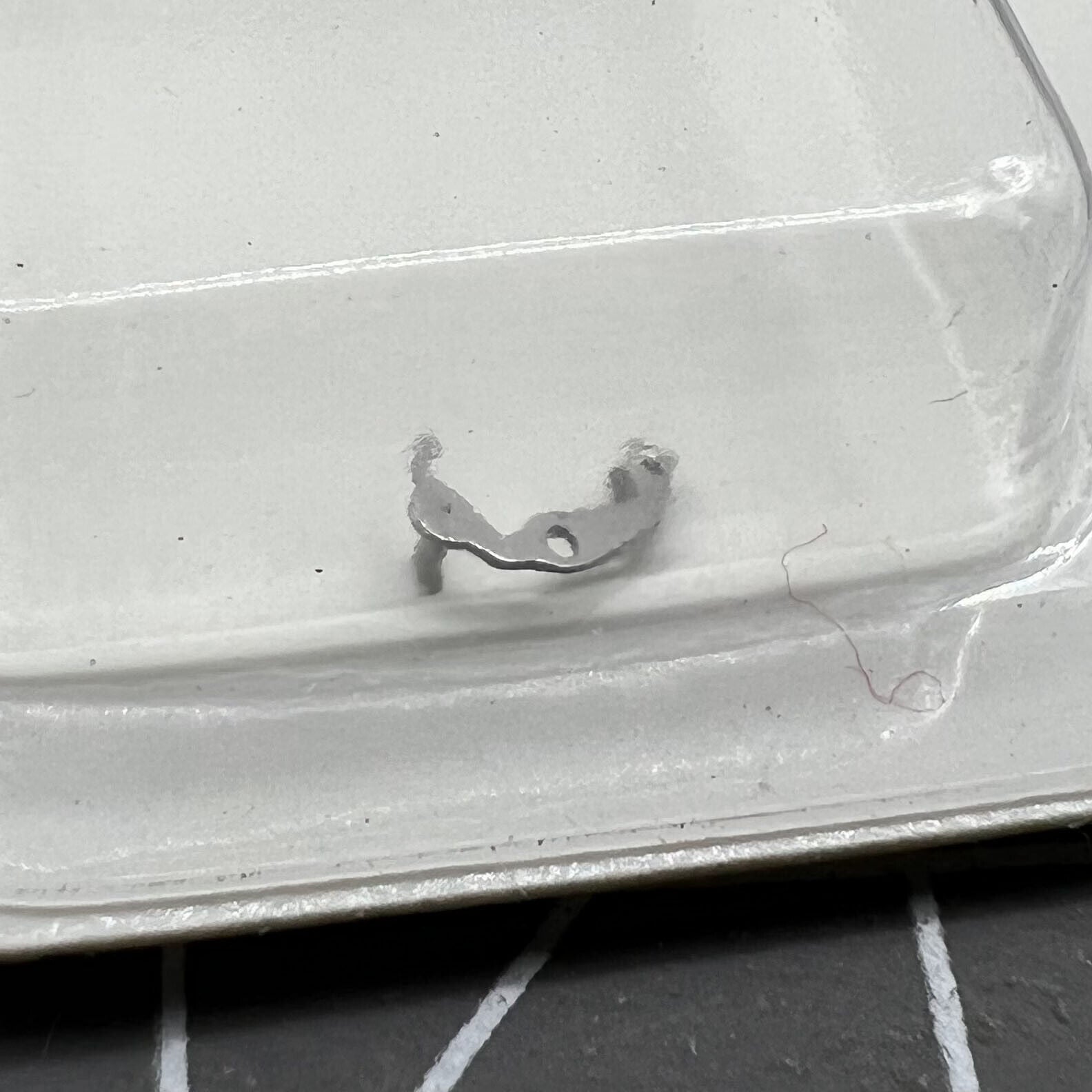 Date corrector lever for ETA 2671 watch movement, precise repair part for accurate timekeeping.