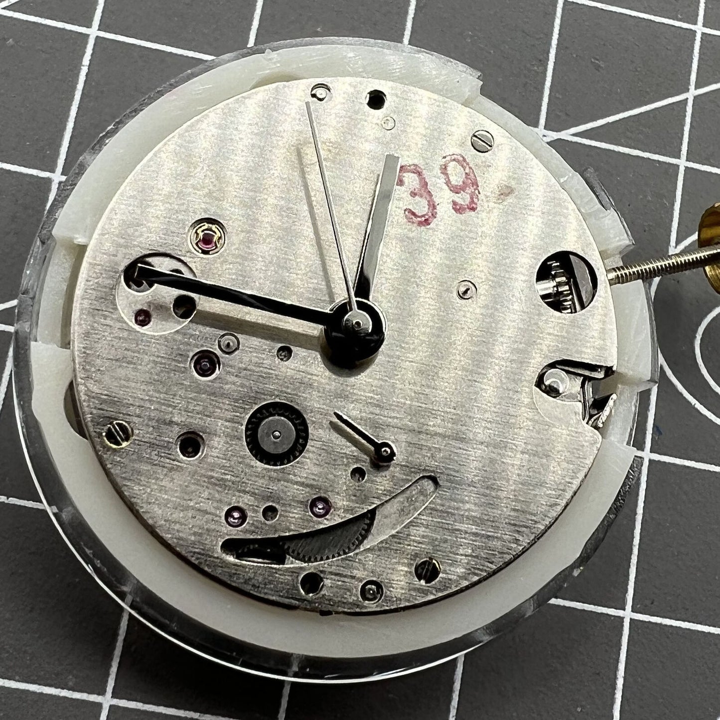 Dandong 7750 automatic watch movement with small seconds at 6 o'clock, ultra-thin design.