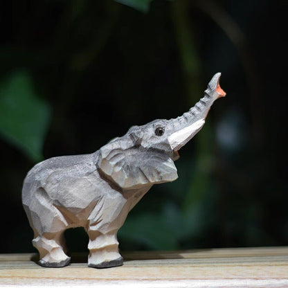 Handmade Upturned Rolled Nosed Elephant wooden figurine, ideal decorative display for watch accessories.