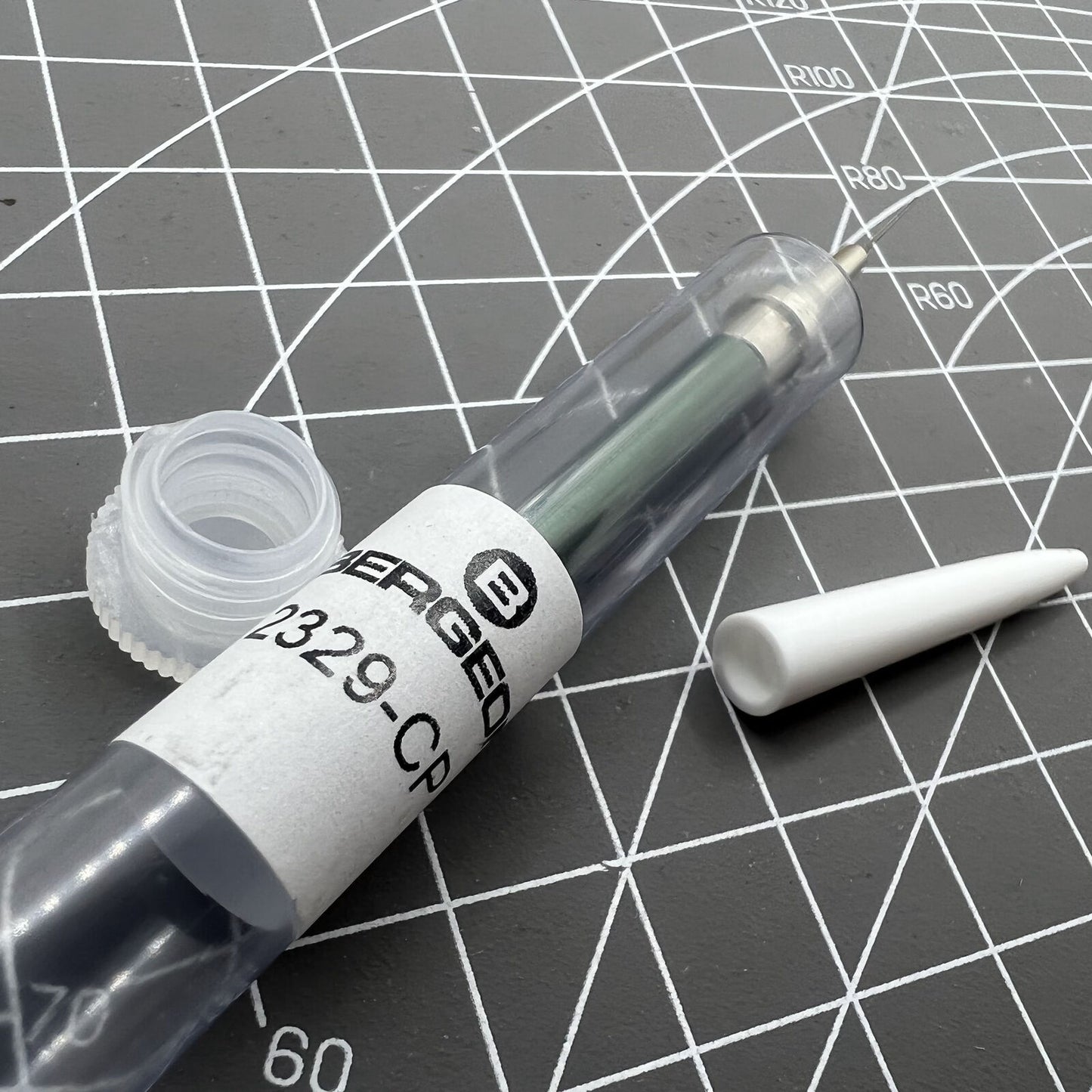 Bergeon 2329-CP watch oiler tool with stand, ideal for precise lubrication in watch repairs.