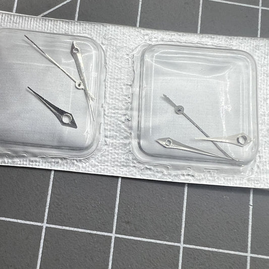 Silver 15mm arrow-shaped watch hands set for Miyota 2035 movement, precision design.