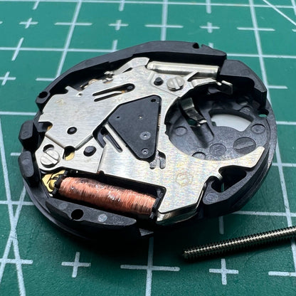 Hattori Epson TMI VX12 quartz watch movement with date at 3 o'clock, precise and reliable mechanism