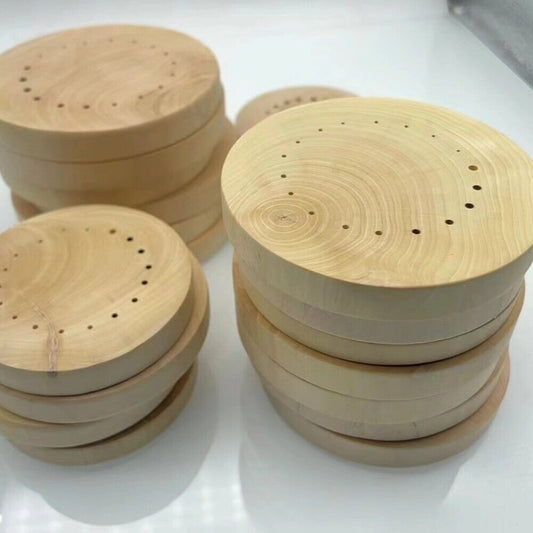 Boxwood watch hand wheels mount holder with copper tube for precise watch repairs, ideal for horology enthusiasts.