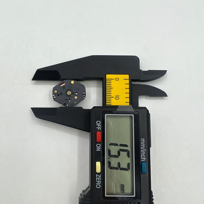 Hattori Epson VX50E quartz watch movement, precision Japanese mechanism for watch accessory repairs.