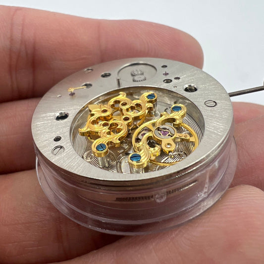 Multifunctional automatic watch with mechanical movement and kinetic energy tourbillon