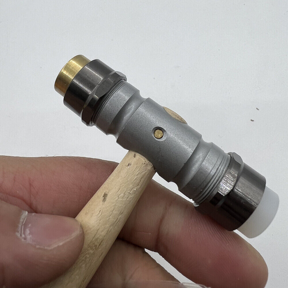 Bergeon 30417 watchmaker hammer with replaceable brass and synthetic ends for precision repairs.