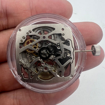 Tianjin Seagull ST25 automatic square watch movement featuring silver three hands and hollow design for watch accessories.