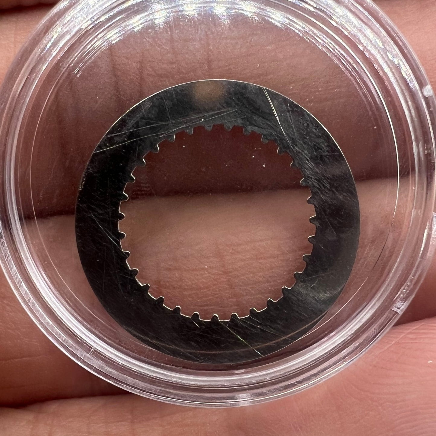 Golden date disk wheel with black numbers for RLX 3135 watch movement, precision replacement part.