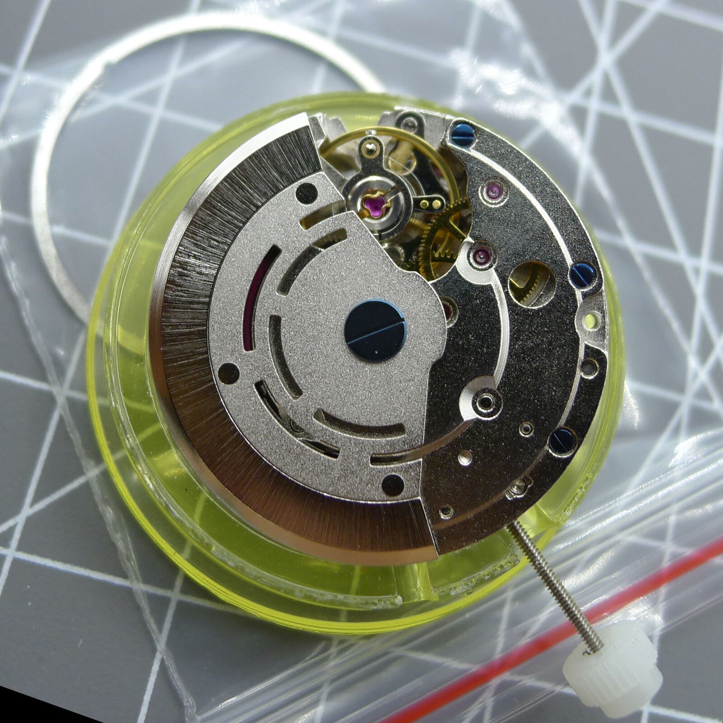 DG2813 silver automatic mechanical watch movement with 4 hands and adjustable 24-hour GMT.