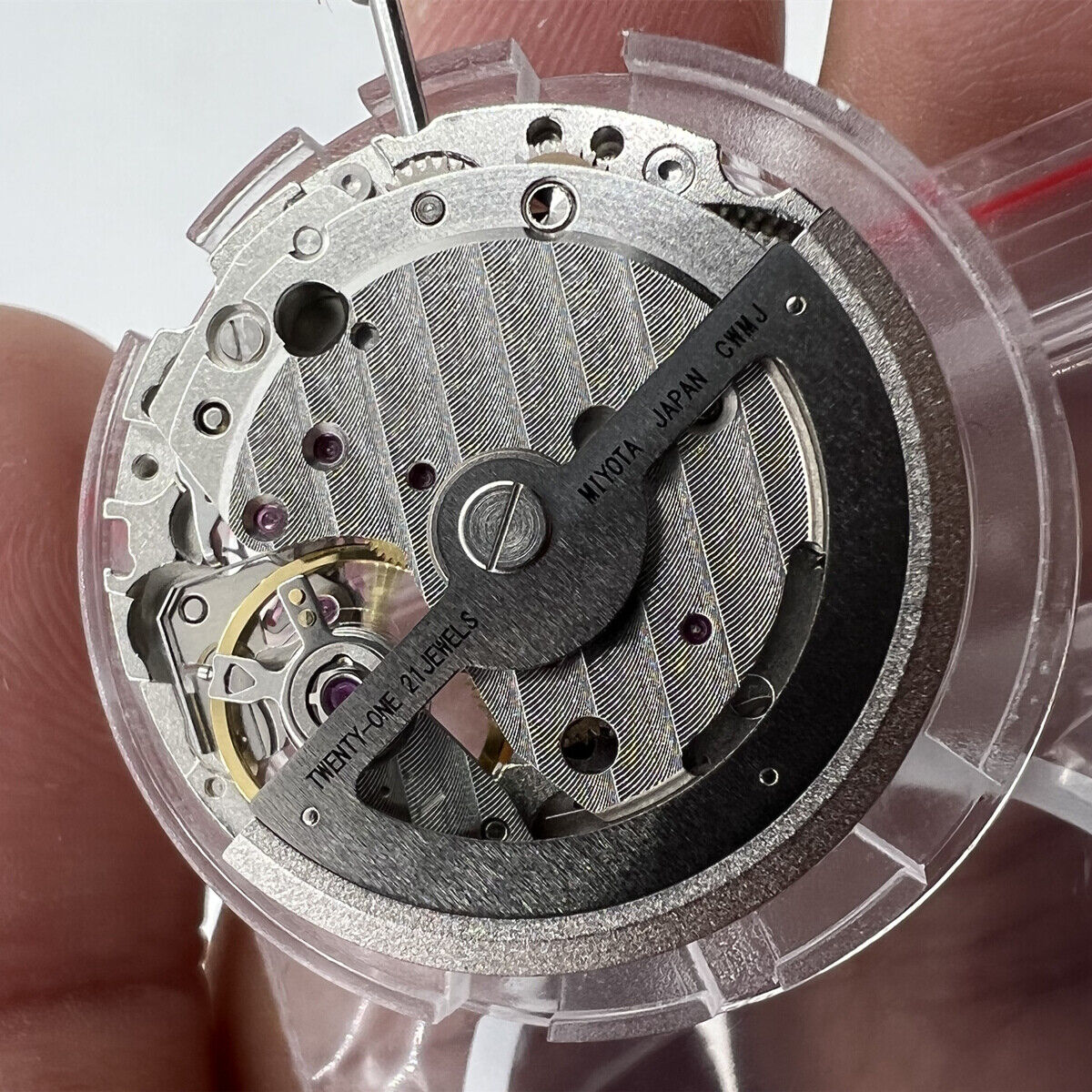 Miyota Citizen 82S7 silver plated automatic watch movement showcasing precise Japanese mechanical components.