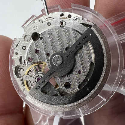 Miyota Citizen 82S7 silver plated automatic watch movement showcasing precise Japanese mechanical components.