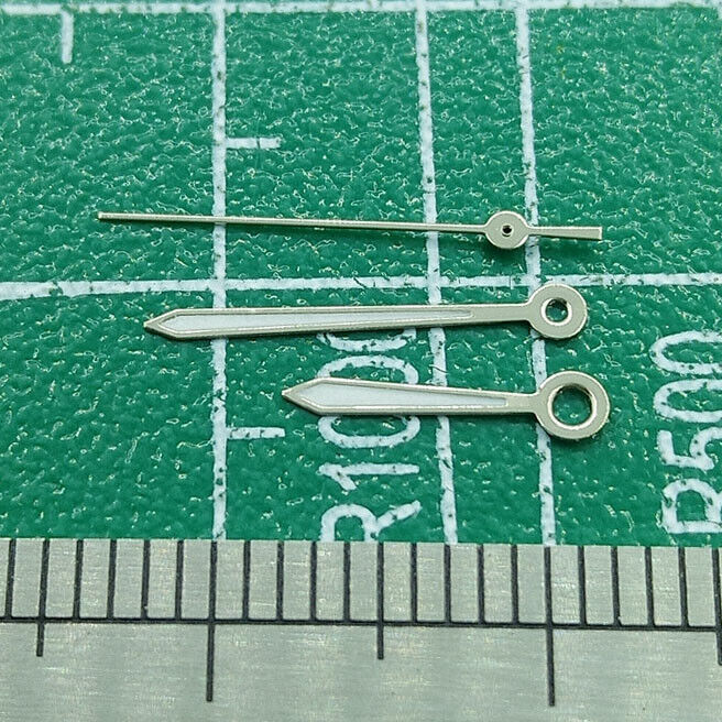 Silver trim 13mm watch hands designed for Miyota 2315-2305 movements, precision timepiece accessory.