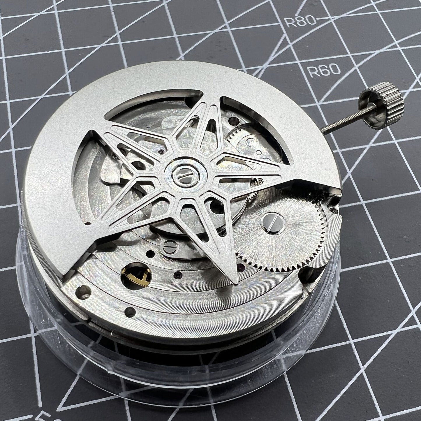 Dandong Silver Hollow Star Moon Phase watch showcasing automatic mechanical movement and elegant design by China Made.