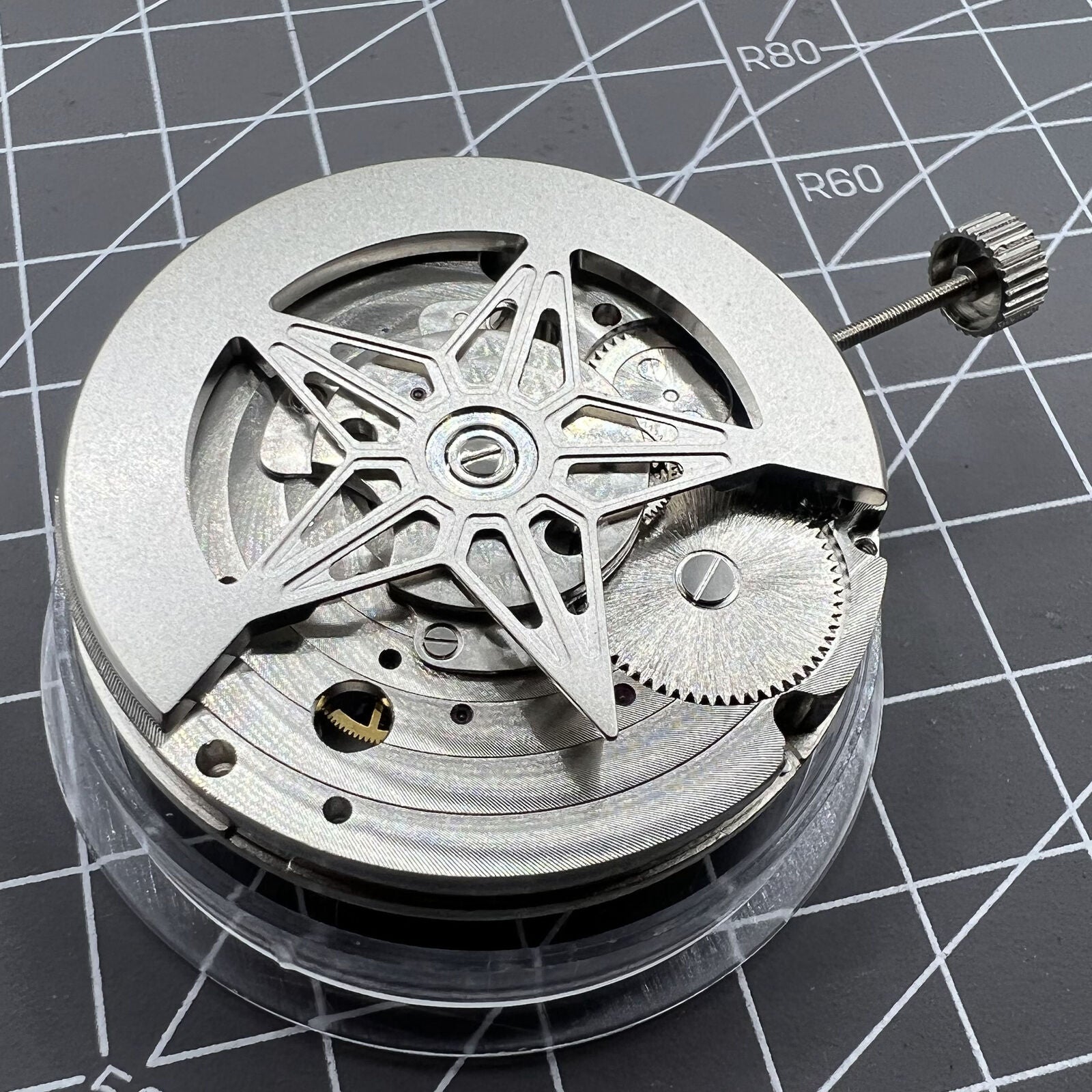 Dandong Silver Hollow Star Moon Phase watch showcasing automatic mechanical movement and elegant design by China Made.