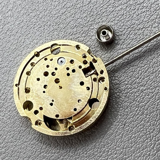 Set of 2 hollow 17.2mm golden mechanical movement cufflink parts for watchmaking.