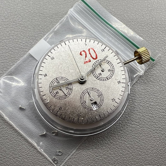 Chronograph watch accessory with ETA 7750 movement, white dial, single calendar at 6, second hand at 9.