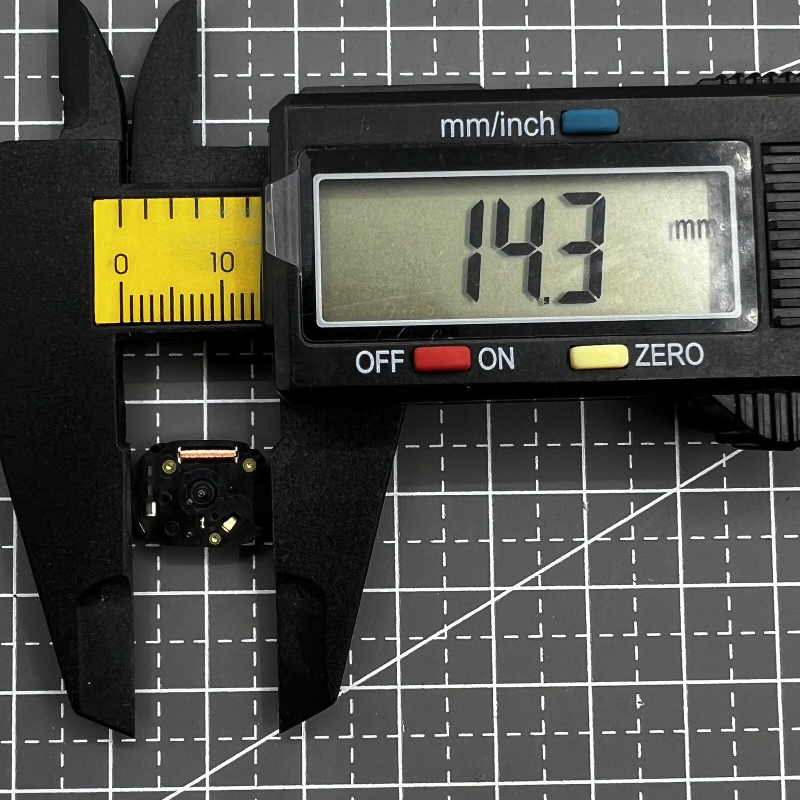 Hattori VX01 quartz watch movement with three hands, precise timekeeping for watch repairs and replacements.
