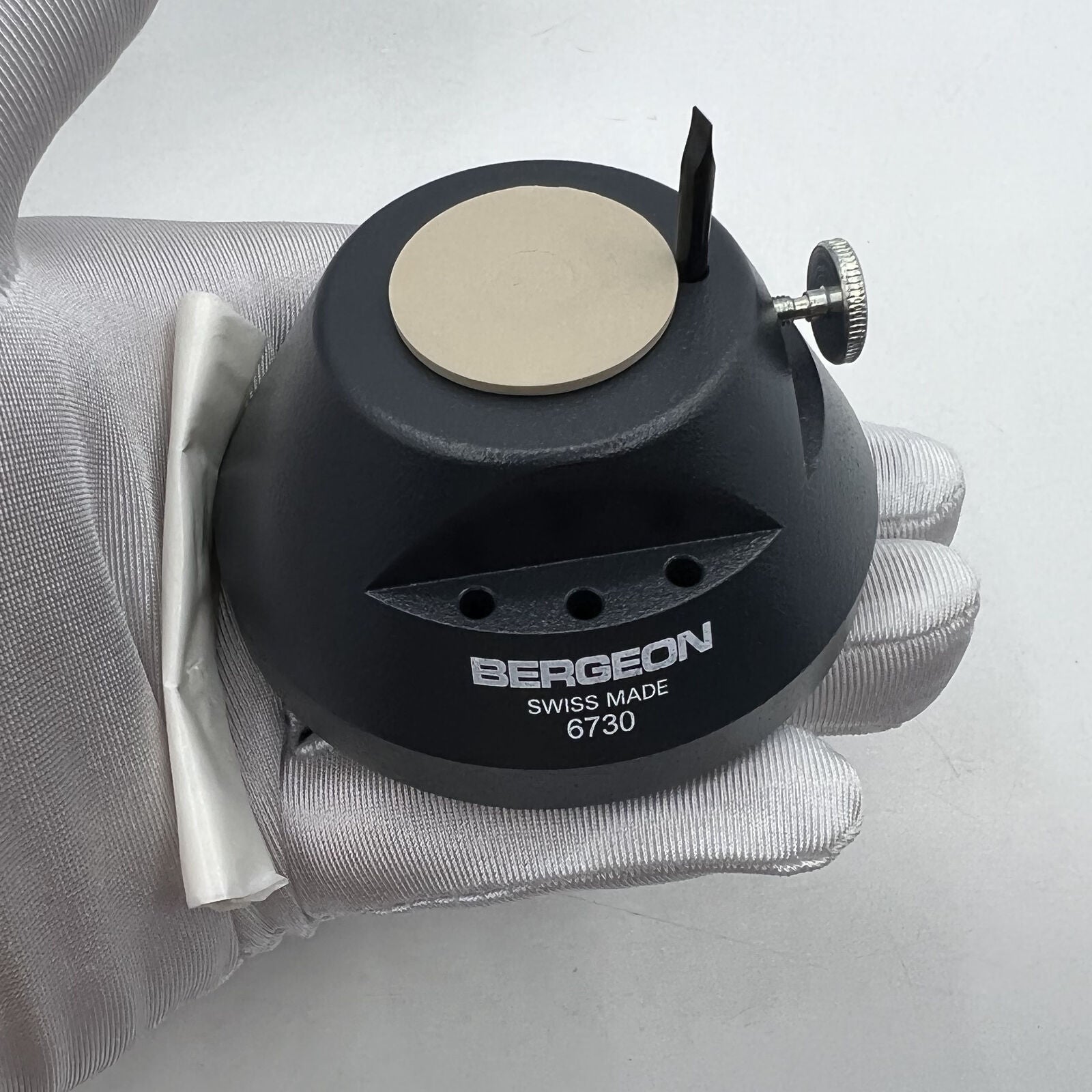 Bergeon 6730 watch band screw holder tool for precise bracelet fitting and removal.
