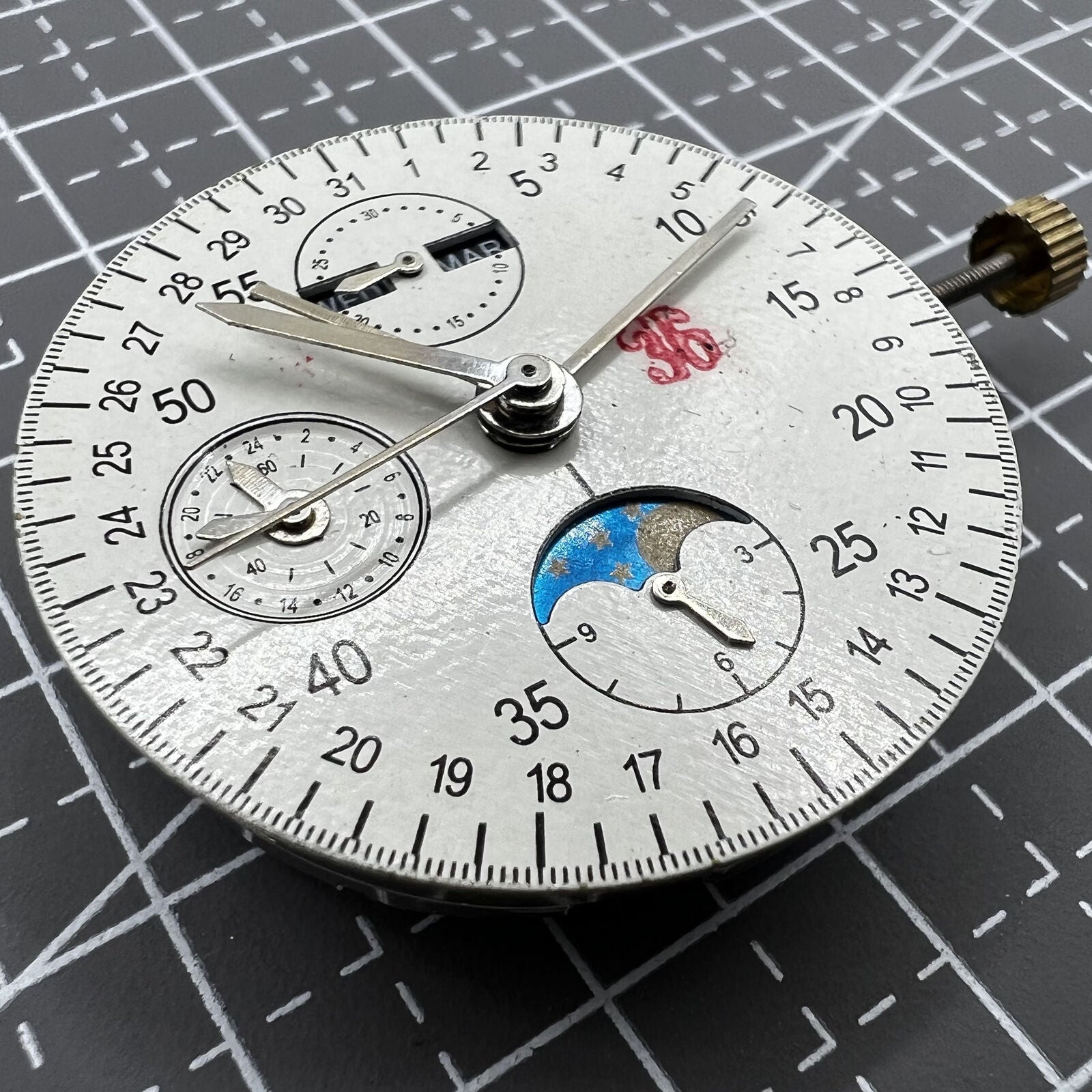 Multifunctional automatic watch with 8 hands and precision Dandong 7751 mechanical movement.