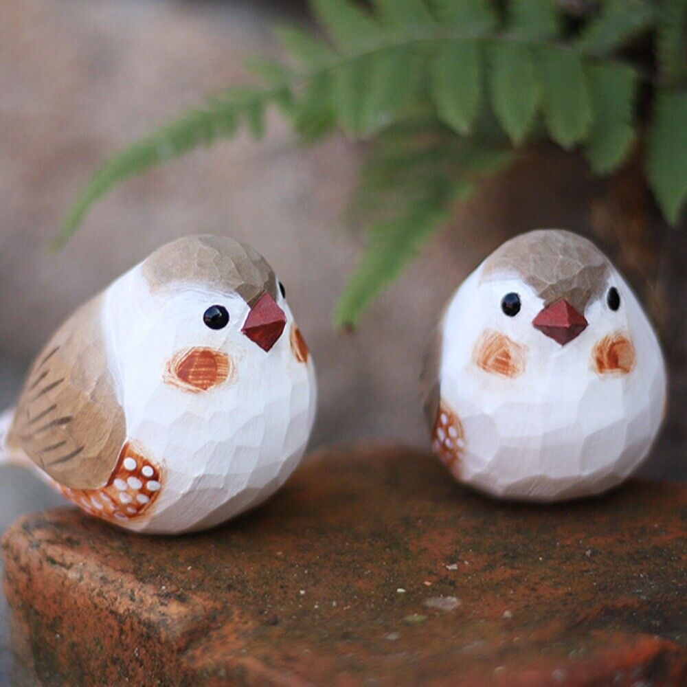 Handmade camel pearl bird figurine, perfect wooden decor for cozy spaces.