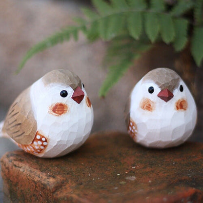 Handmade camel pearl bird figurine, perfect wooden decor for cozy spaces.