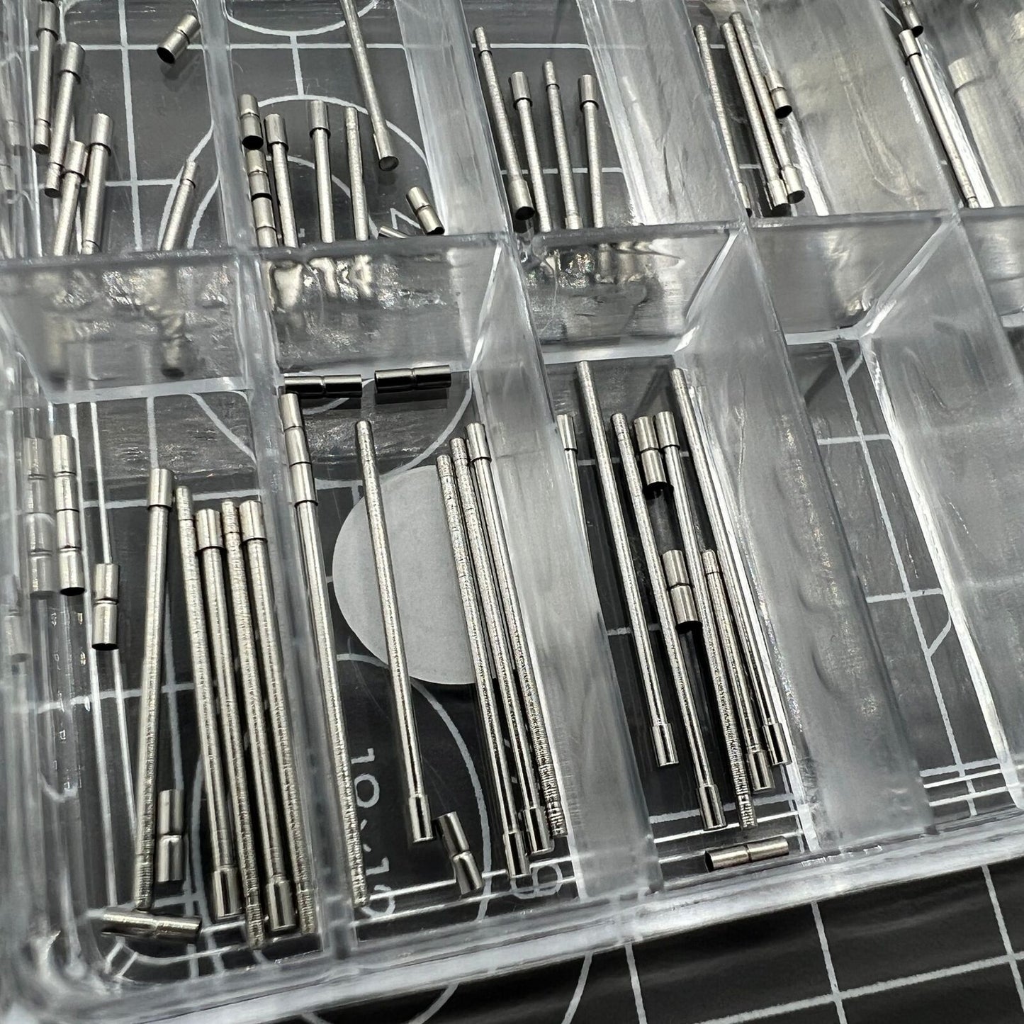 AB-638NTWP stainless steel notched tubes with pins for secure watch band assembly, 60pcs box, ideal for durable repairs.