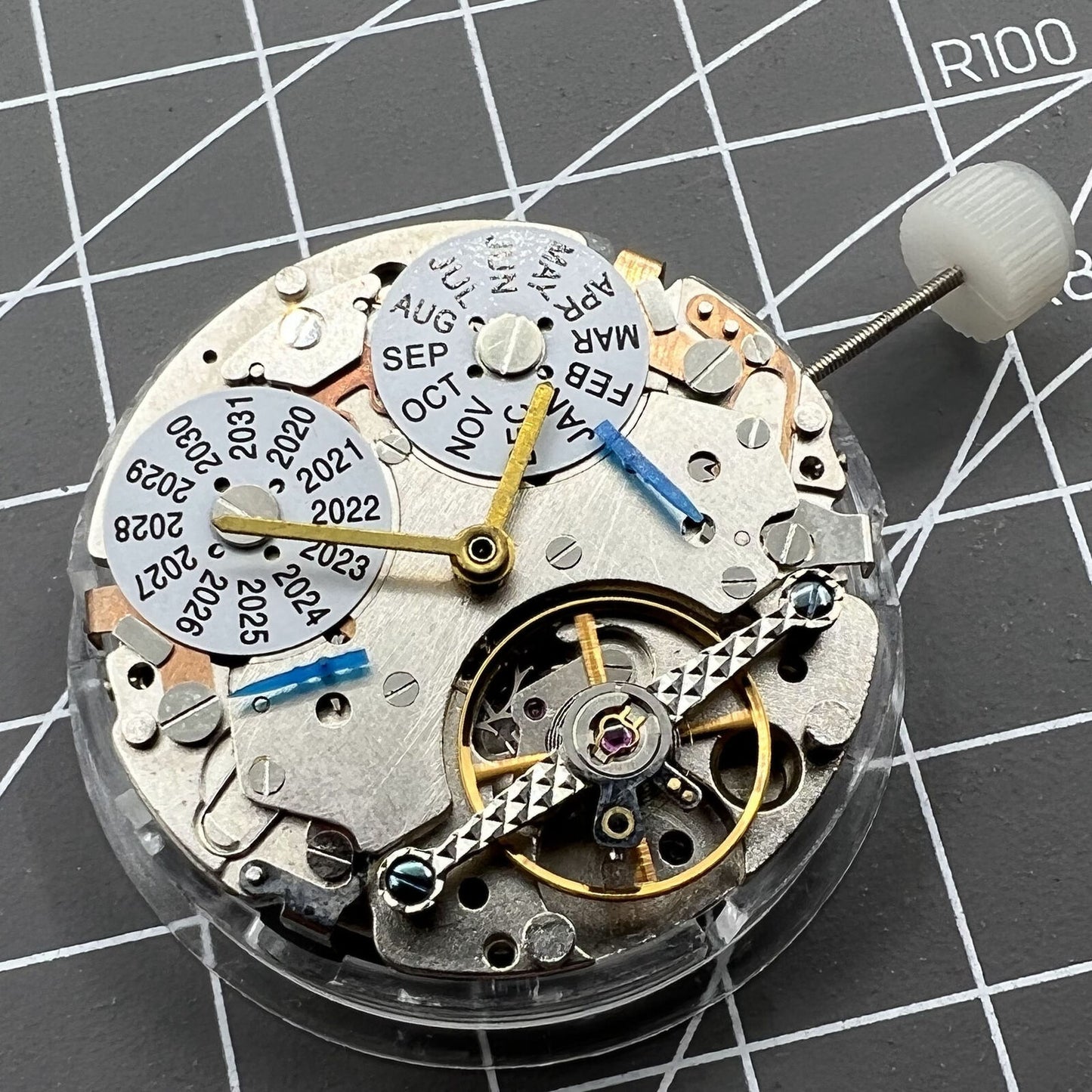 Multifunctional perpetual calendar watch accessory with LB automatic mechanical movement detail.