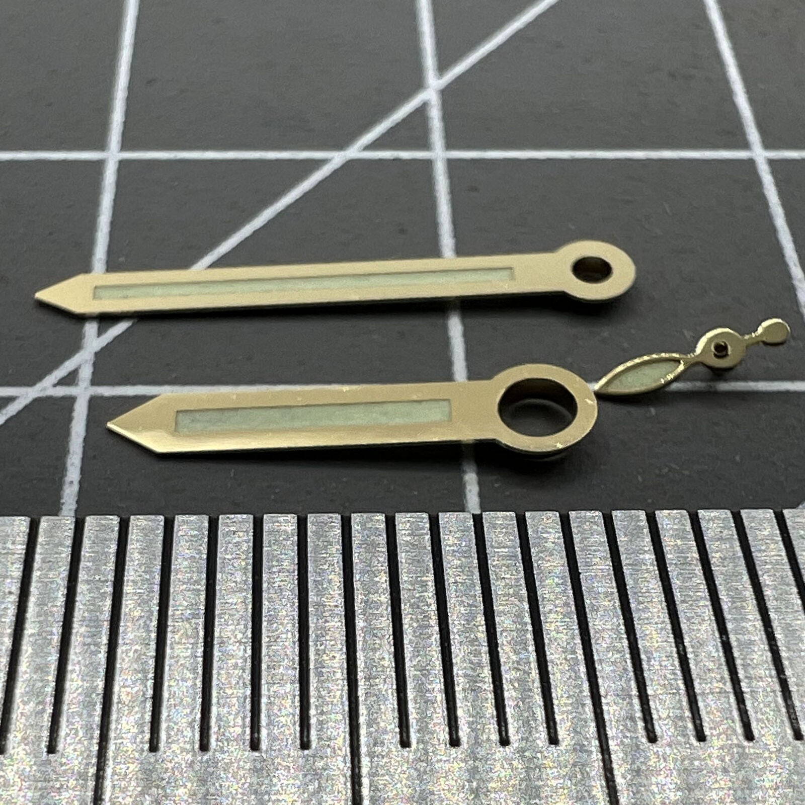 Golden trim green luminous watch hands for ST3600 movement, enhancing visibility and style.