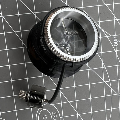 Swiss Bergeon clip-on eyeglass with precision magnification for detailed watch repair tasks