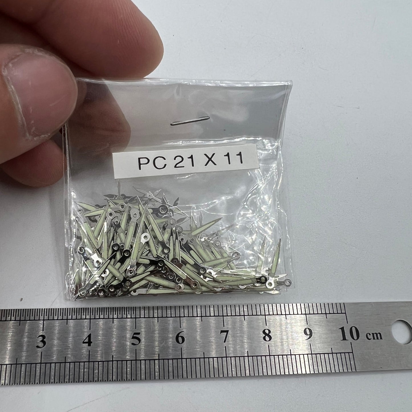 Lot de 100 aiguilles de montre argentées de 11 mm avec luminescentes pour mouvement à quartz Epson PC21