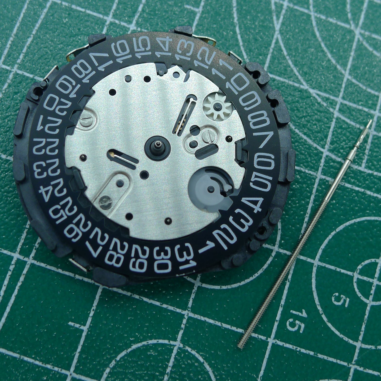 Wholesale VR32B quartz watch movement by Japan Made, black dial, multifunctional for accurate timekeeping.