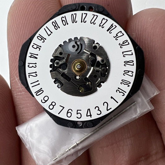 Hattori Epson VX3K quartz watch movement with date at 3/6, precision Japanese craftsmanship.