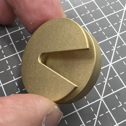 Copper balance wheel holder for precise 25mm watch repair and delicate part cleaning.