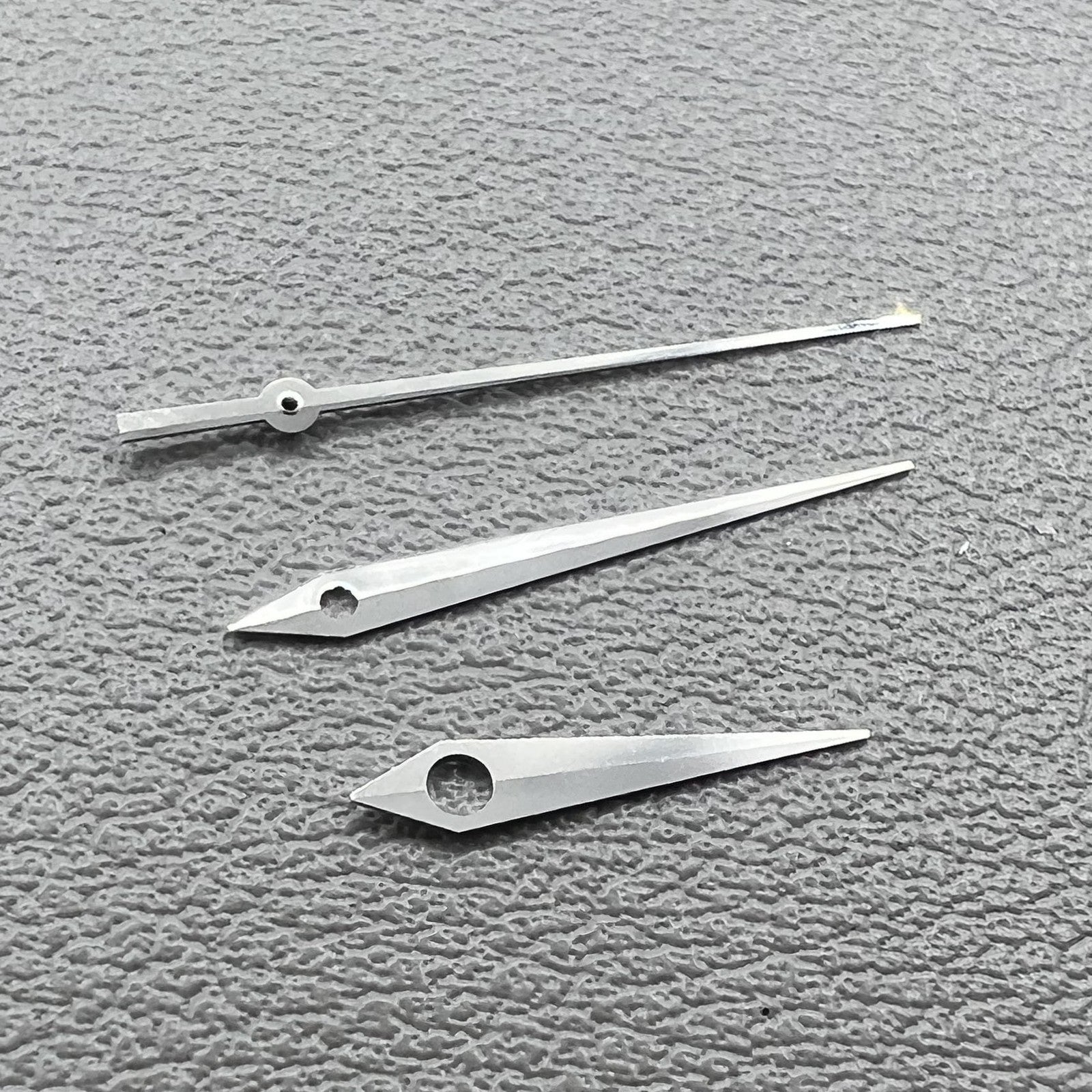 Set of 3 silver watch hands for ETA2836, 2824, 2892A2 series, ideal for precise watch repairs.
