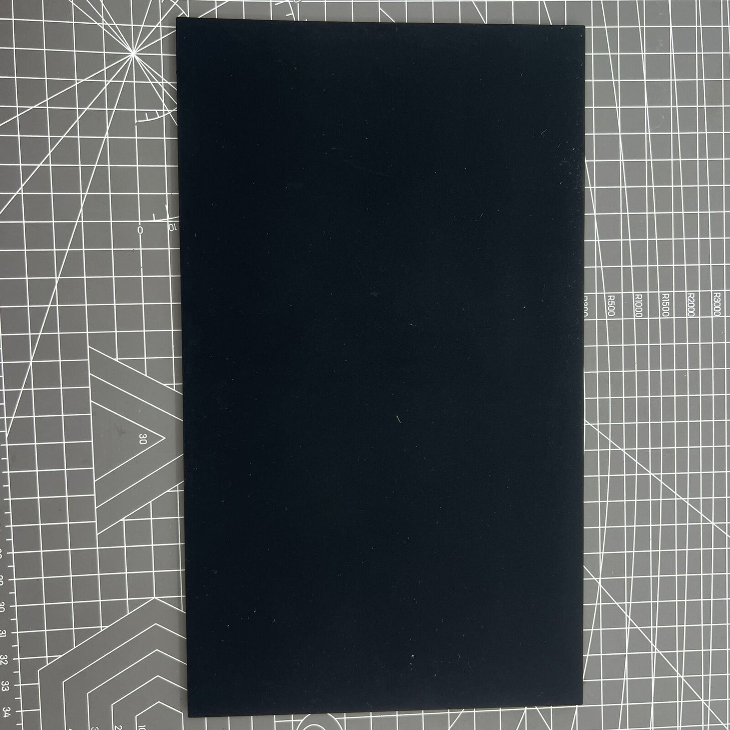 Swiss Horotec MSA24.223 black silicon bench mat featuring 32 grooves for secure watch accessory placement and handling.