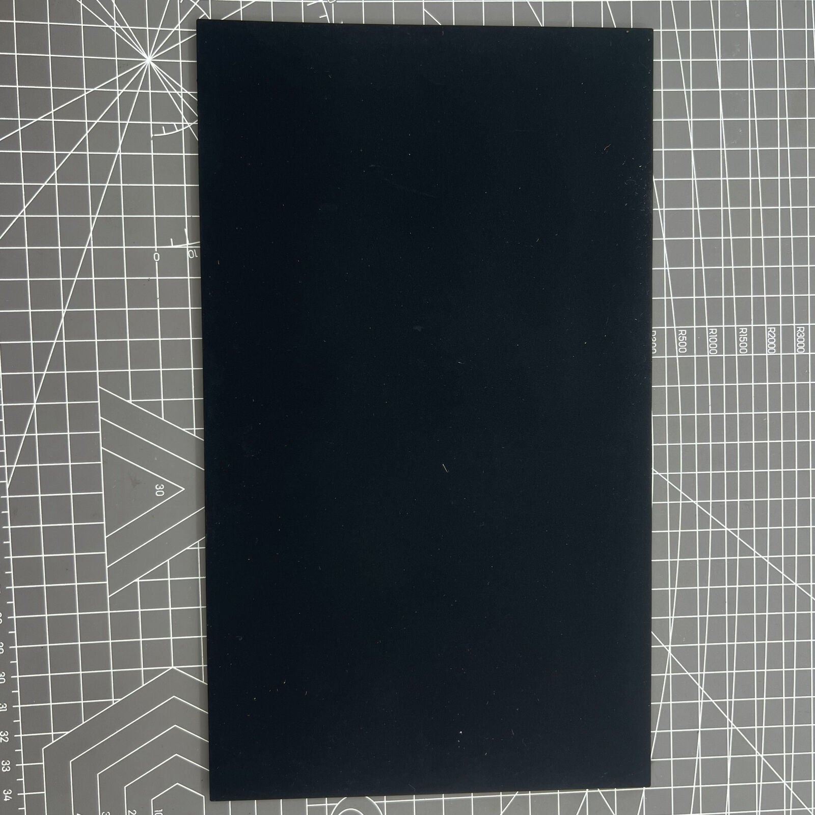 Swiss Horotec MSA24.223 black silicon bench mat featuring 32 grooves for secure watch accessory placement and handling.